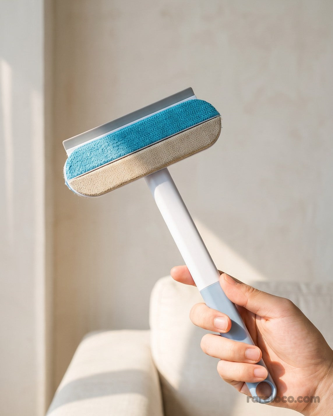The brush held in one hand