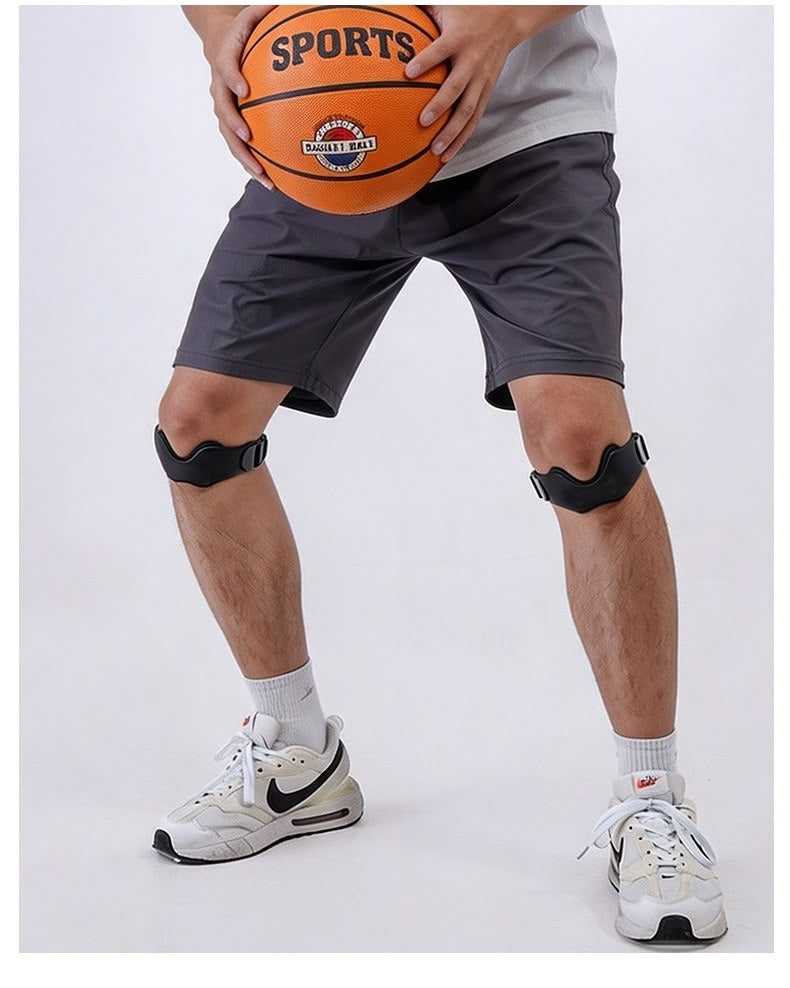 A basketball player wearing a strap on each knee