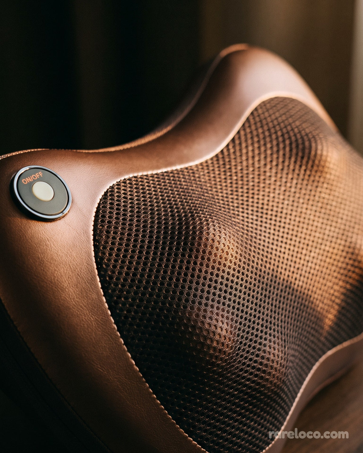 Close-up of the mesh panel and the power button