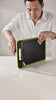 The 4-in-1 cutting board in use: chopping, grinding, defrosting